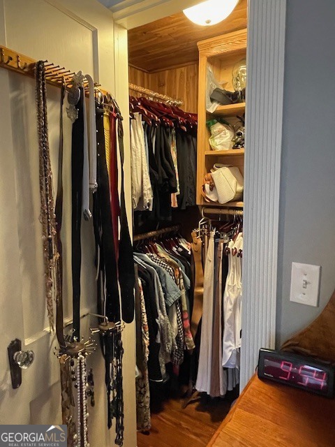 311 3rd Street Manchester, GA 31816 - Photo 37 of 61 a view of walk in closet with clothes and shoes