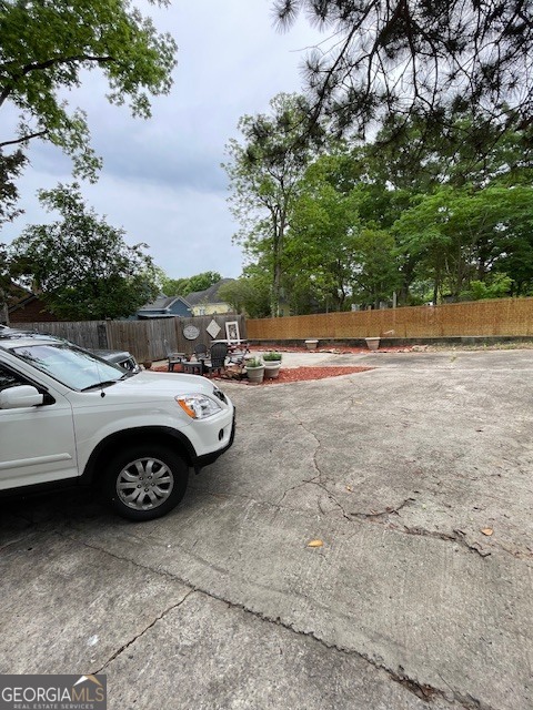 311 3rd Street Manchester, GA 31816 - Photo 55 of 61 a view of a car parked in a parking area with road