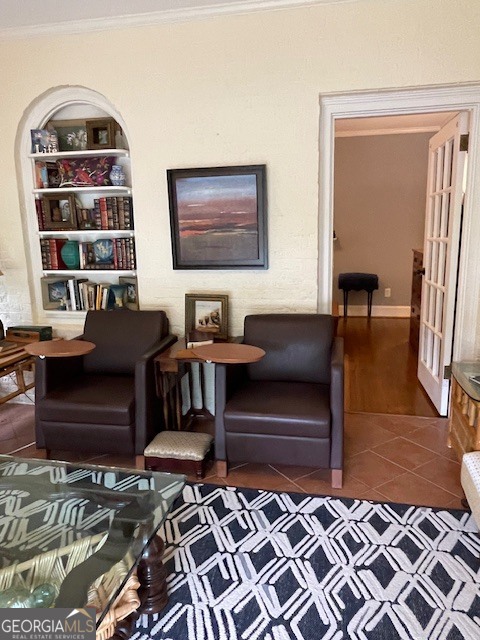 311 3rd Street Manchester, GA 31816 - Photo 10 of 61 a living room with a couch and a bookshelf