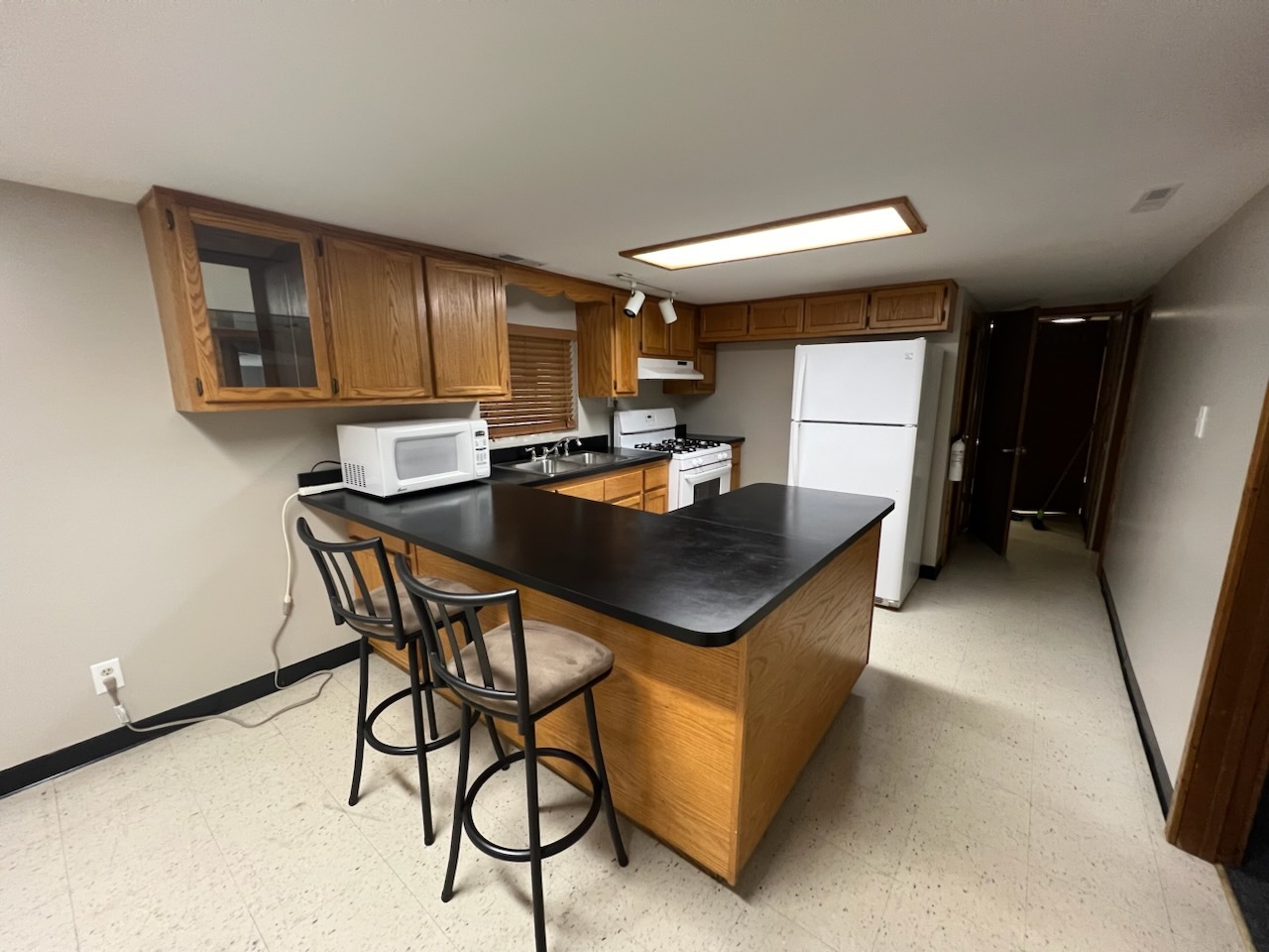 4818 North Moody Avenue, Unit G Chicago, IL 60630 - Photo 3 of 11 a kitchen with a table and chairs in it