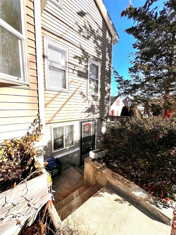 50 Mapleville Main Burrillville, RI 02839 - Photo 8 of 36 IN LAW ENTRY FRONT