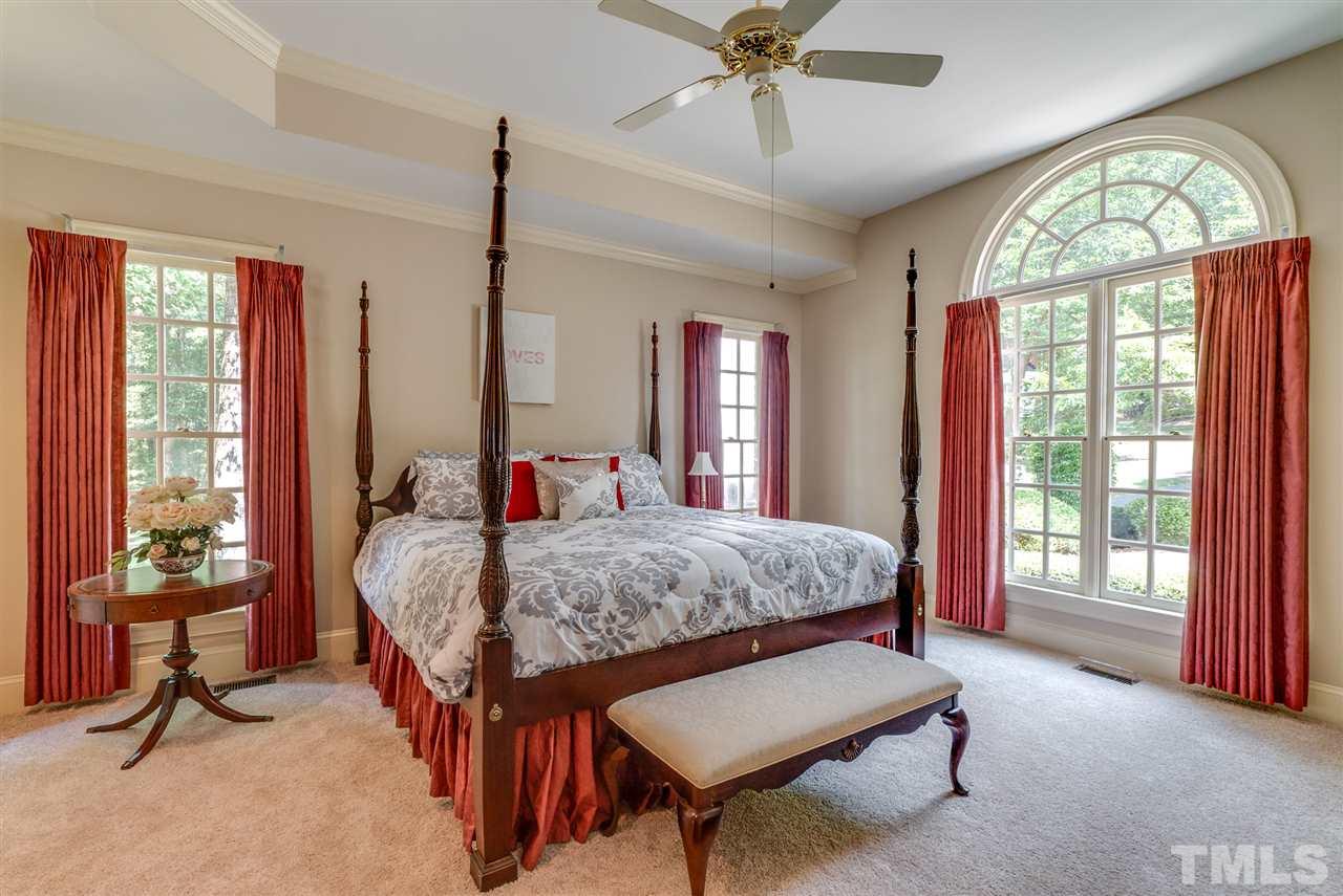 8912 Carnoustie Way Raleigh, NC 27613 - Photo 10 of 25 a living room with furniture and a large window