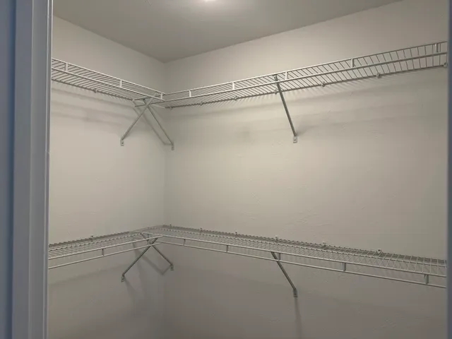 a view of a room with racks on the wall