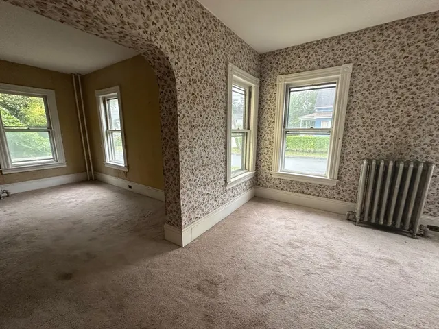 an empty room with windows