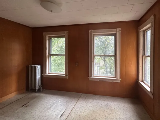 an empty room with windows