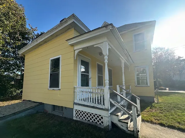 a view of a house with a roof deck
