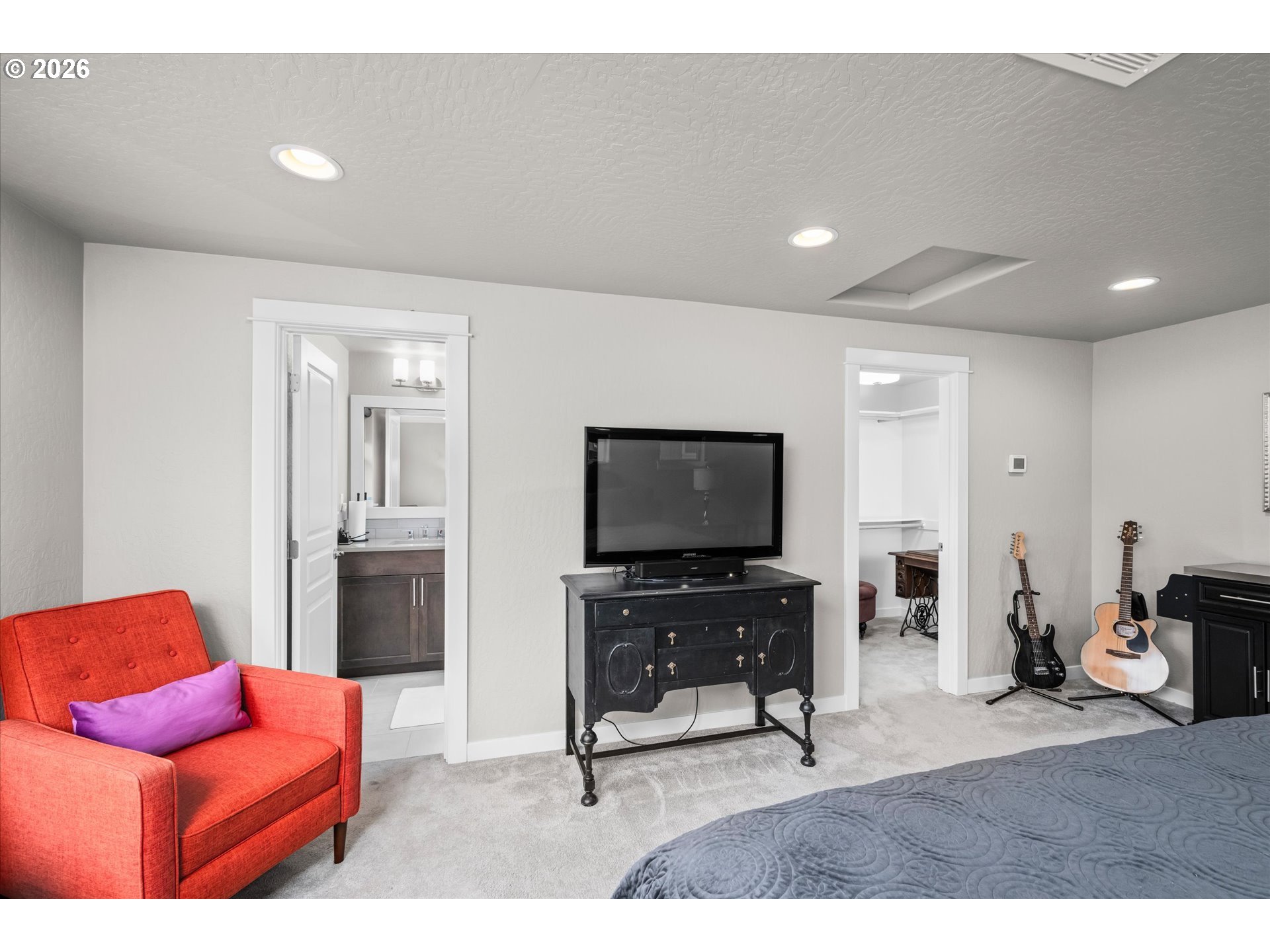 709 Tyson Lane Eugene, OR 97404 - Photo 19 of 31 a living room with furniture and a flat screen tv