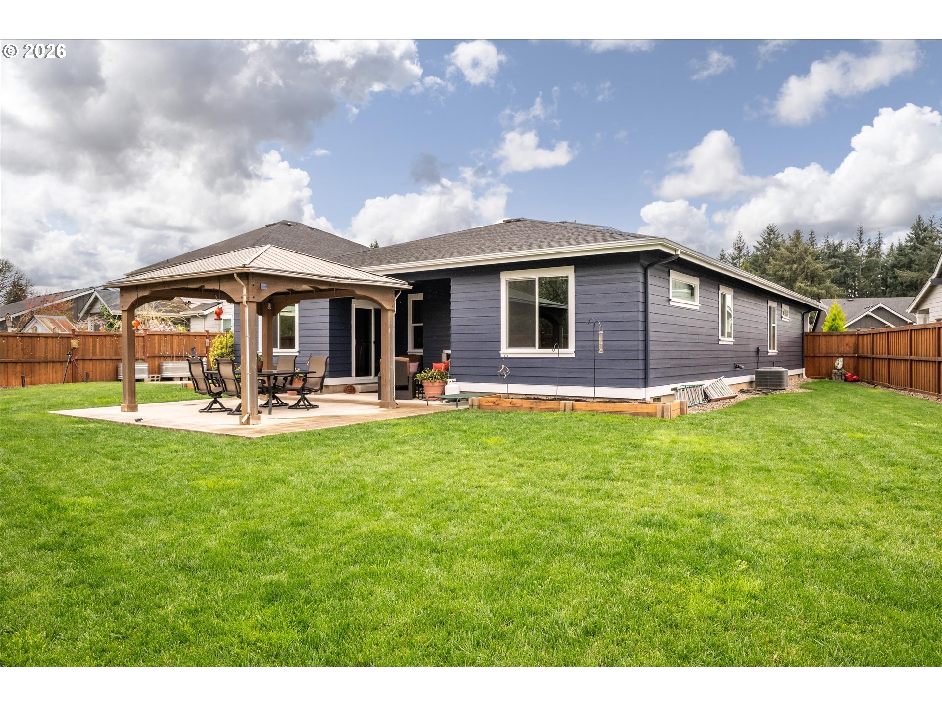709 Tyson Lane Eugene, OR 97404 - Photo 26 of 31 a front view of house with yard and green space