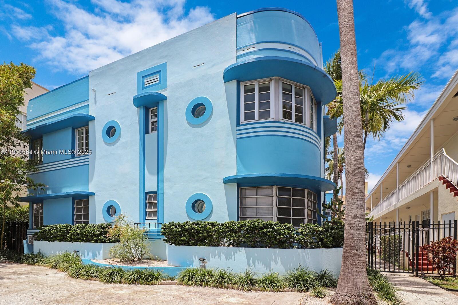 1250 Drexel Avenue, Unit 7 Miami Beach, FL 33139 - Photo 27 of 30 a front view of a house with a yard