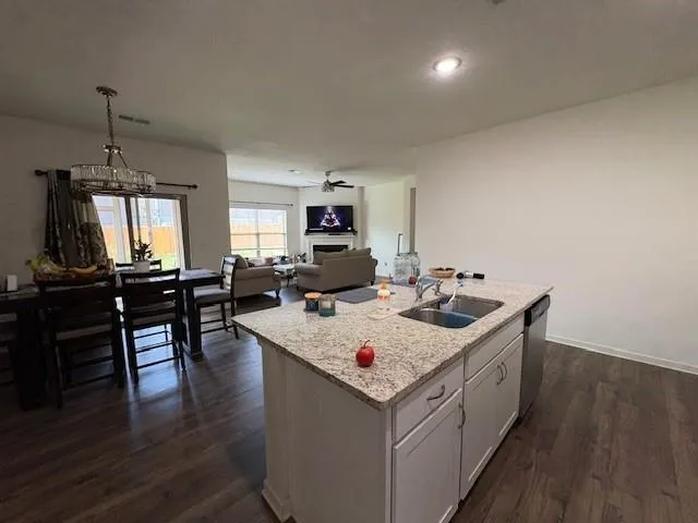 a view of swimming pool is middle in the backyard