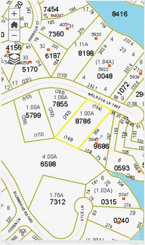 wooden view of a book and a white comforter