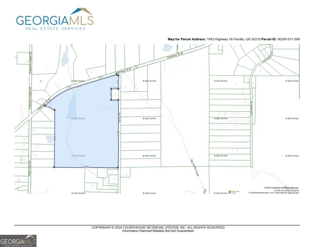 a black and white photo of a living room