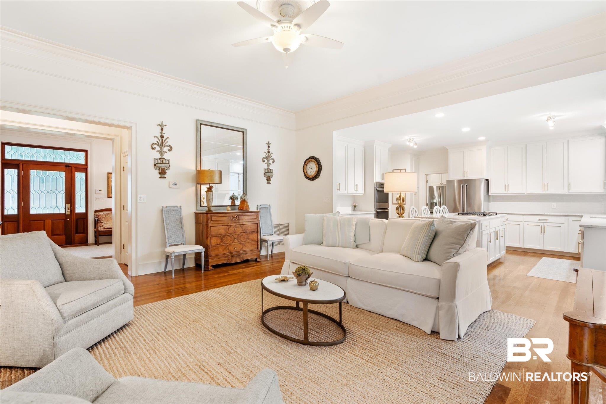 6458 Raintree Road Fairhope, AL 36532 - Photo 12 of 65 Living room featuring light hardwood / wood-style flooring, ceiling fan, and crown molding