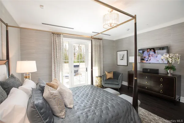 a bedroom with a bed and furniture