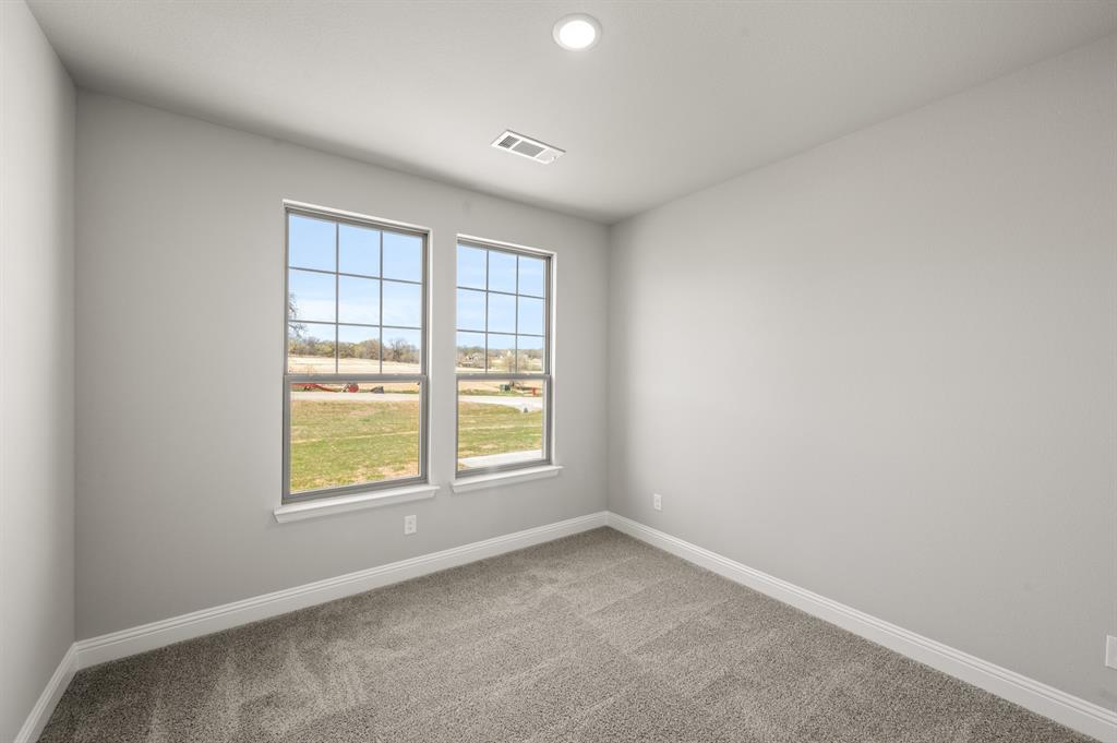 7016 Ranch View Place Springtown, TX 76082 - Photo 21 of 29 an empty room with a window