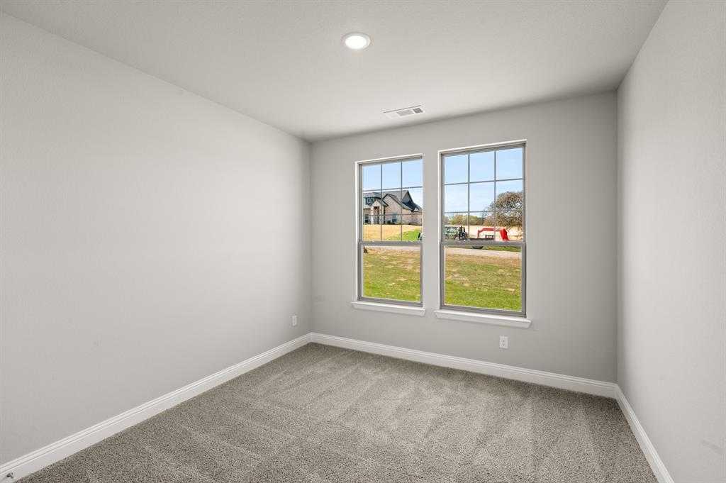 7016 Ranch View Place Springtown, TX 76082 - Photo 22 of 29 an empty room with a window