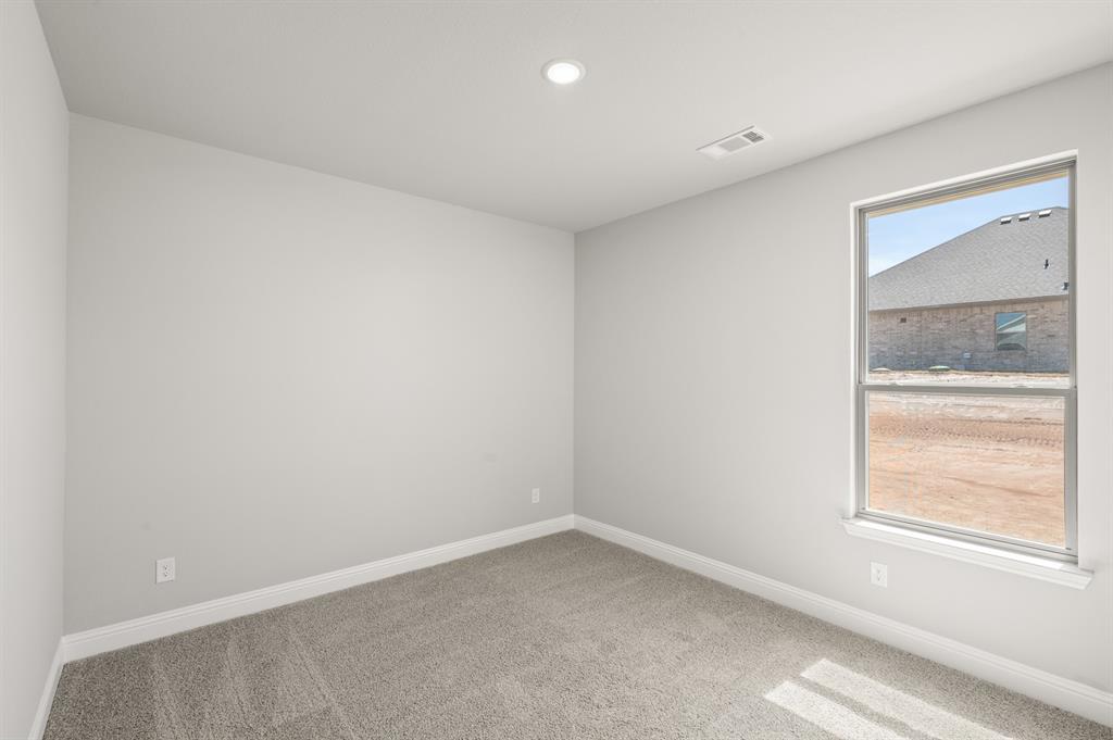 7016 Ranch View Place Springtown, TX 76082 - Photo 23 of 29 an empty room with a window