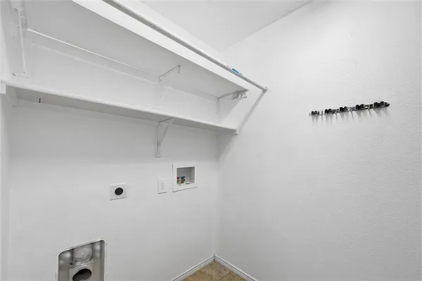 a view of small space with racks on the wall