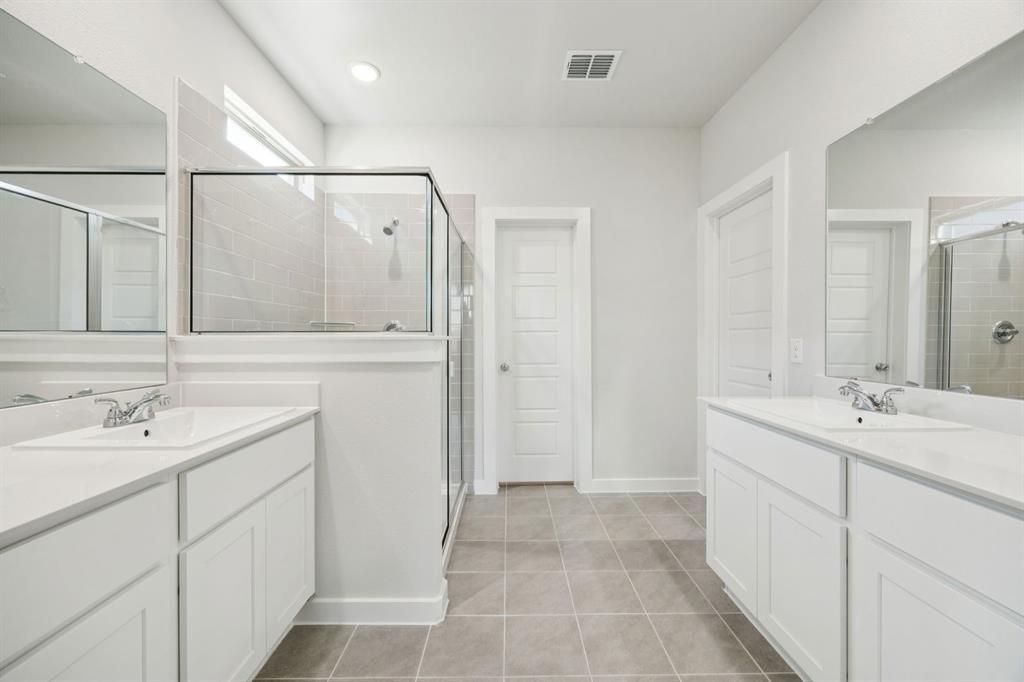 1128 Del Rio Drive Lavon, TX 75166 - Photo 16 of 31 Primary Bathroom in the Masters home plan by Trophy Signature Homes – REPRESENTATIVE PHOTO