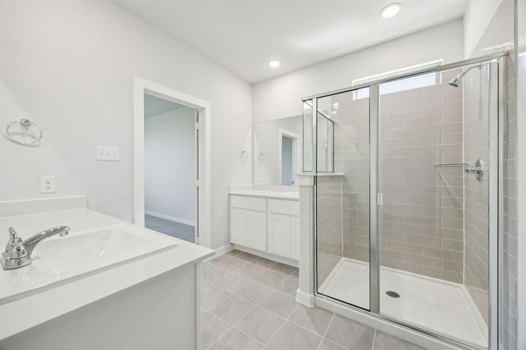 1128 Del Rio Drive Lavon, TX 75166 - Photo 17 of 31 Primary Bathroom in the Masters home plan by Trophy Signature Homes – REPRESENTATIVE PHOTO