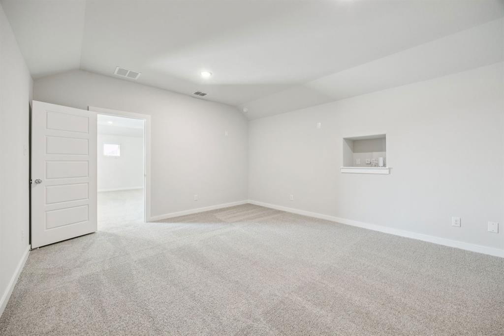 1128 Del Rio Drive Lavon, TX 75166 - Photo 20 of 31 Media room in the Masters home plan by Trophy Signature Homes – REPRESENTATIVE PHOTO