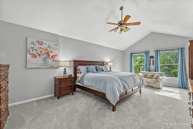 a bathroom with a granite countertop sink mirror and bathtub