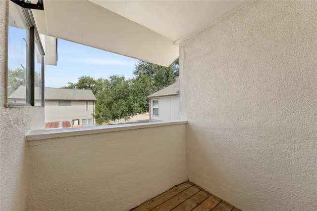 a view of a room with rack on the wall