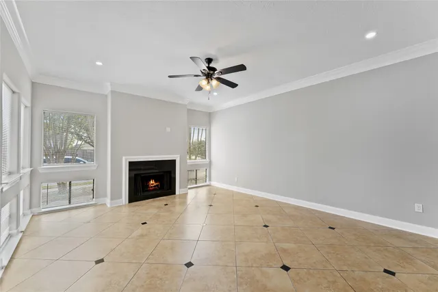 a view of an empty room with a fireplace