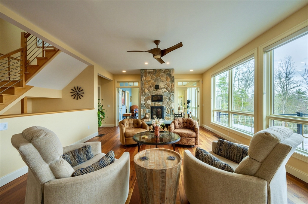 1089 Westhampton Road Northampton, MA 01062 - Photo 13 of 42 a living room with furniture and a large window