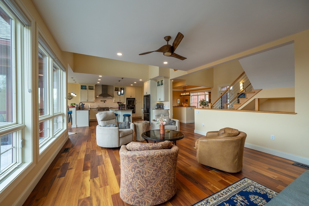1089 Westhampton Road Northampton, MA 01062 - Photo 15 of 42 a living room with furniture and a wooden floor