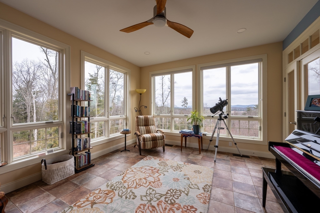 1089 Westhampton Road Northampton, MA 01062 - Photo 25 of 42 a living room with furniture and large windows