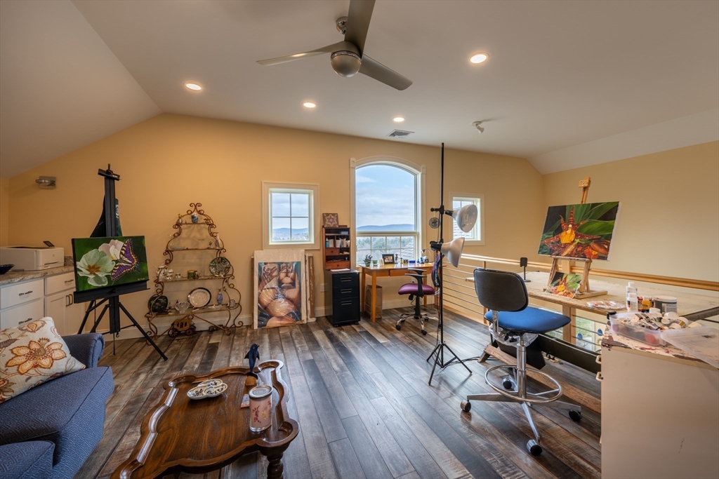 1089 Westhampton Road Northampton, MA 01062 - Photo 30 of 42 a view of a workspace with furniture and a living room
