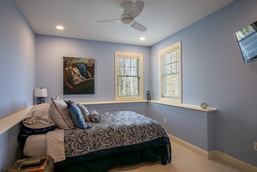 1089 Westhampton Road Northampton, MA 01062 - Photo 38 of 42 a bedroom with a bed and painting on the wall
