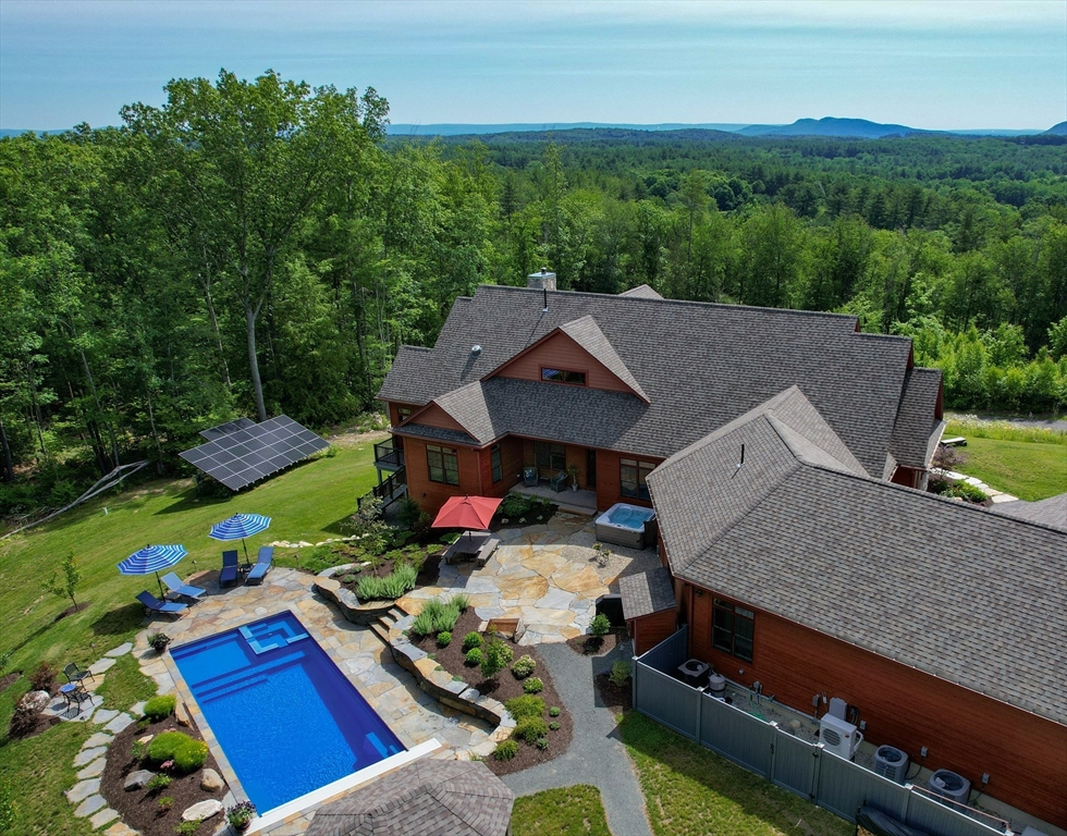 1089 Westhampton Road Northampton, MA 01062 - Photo 7 of 42 an aerial view of a house with a garden