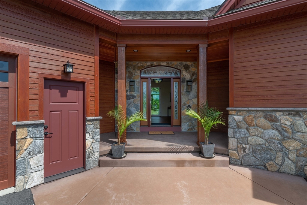 1089 Westhampton Road Northampton, MA 01062 - Photo 9 of 42 a view of a entryway door of the house
