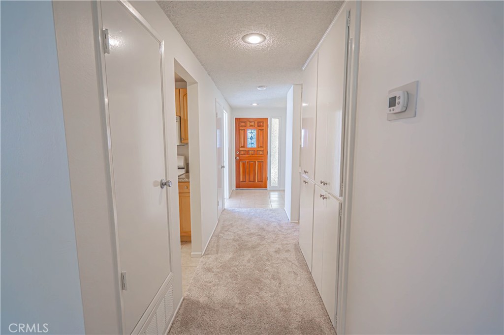 19433 Oak Crossing Road Newhall, CA 91321 - Photo 12 of 51 hallway to entrance door