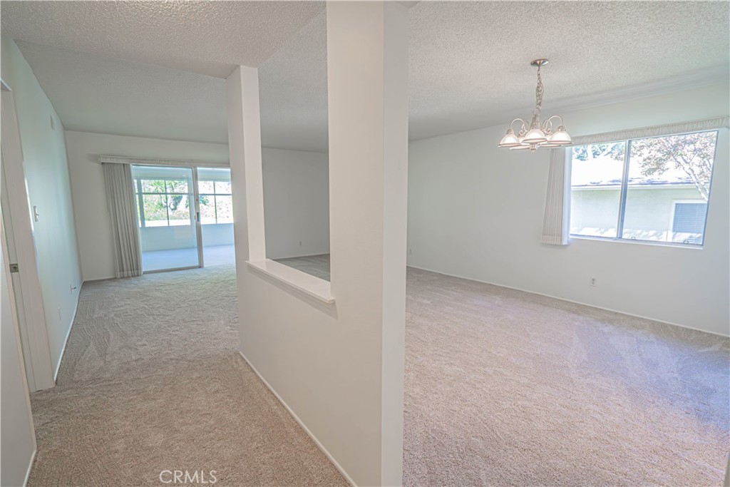 19433 Oak Crossing Road Newhall, CA 91321 - Photo 7 of 51 living / dining from hallway