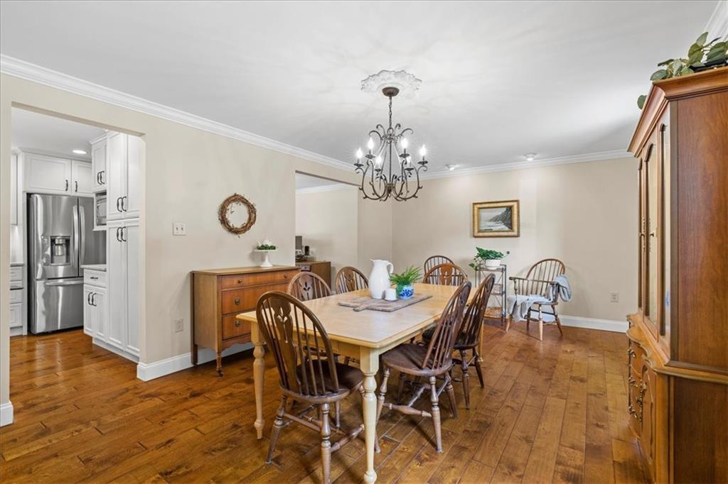 115 Windmill Road Butler, PA 16002 - Photo 13 of 36 a view of a dining room with furniture and chandelier