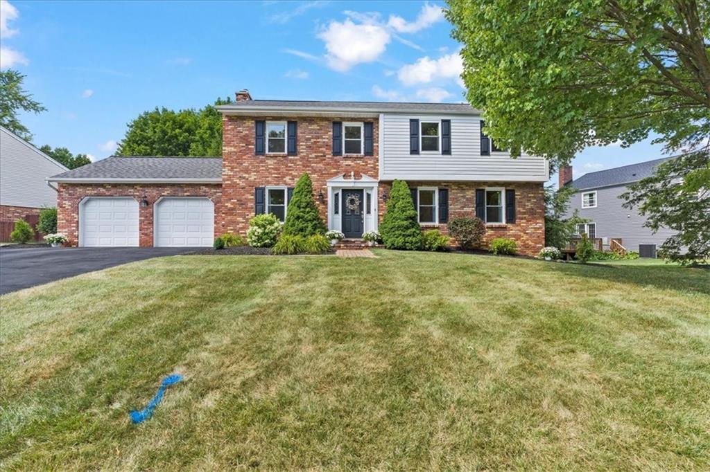 115 Windmill Road Butler, PA 16002 - Photo 2 of 36 a front view of a house with a yard