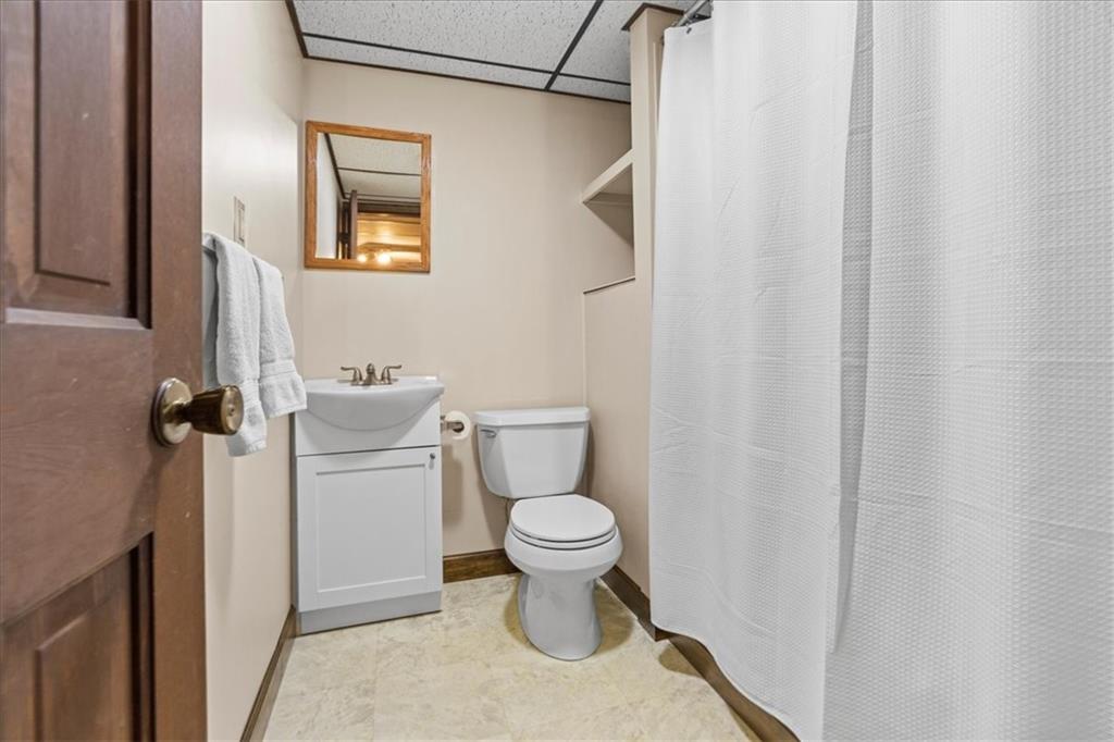 115 Windmill Road Butler, PA 16002 - Photo 28 of 36 a bathroom with a toilet and a sink