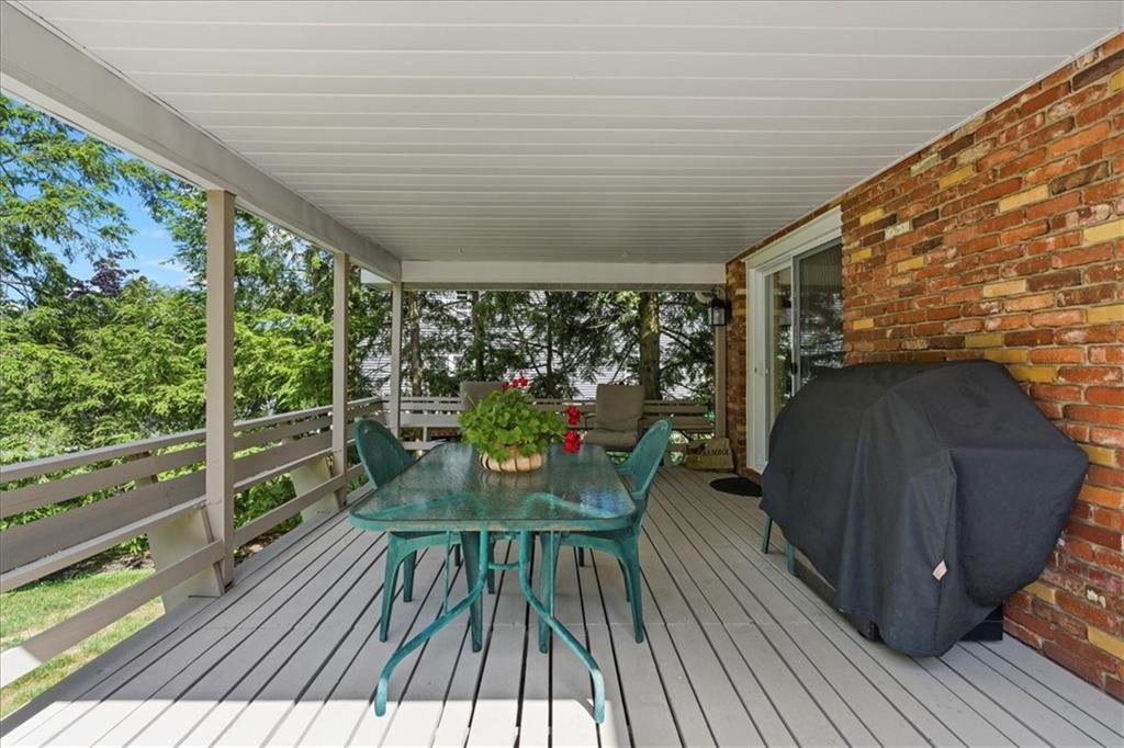 115 Windmill Road Butler, PA 16002 - Photo 30 of 36 a balcony with wooden floor table and chairs
