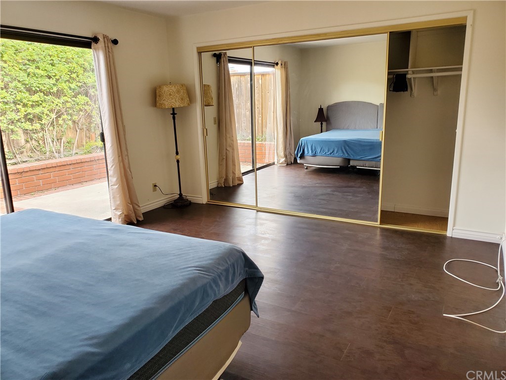 5001 Paseo Dali Irvine, CA 92603 - Photo 14 of 20 a bedroom with a bed and a window