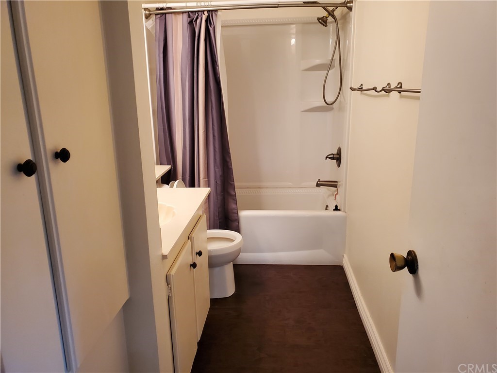 5001 Paseo Dali Irvine, CA 92603 - Photo 19 of 20 a bathroom with a toilet and a shower