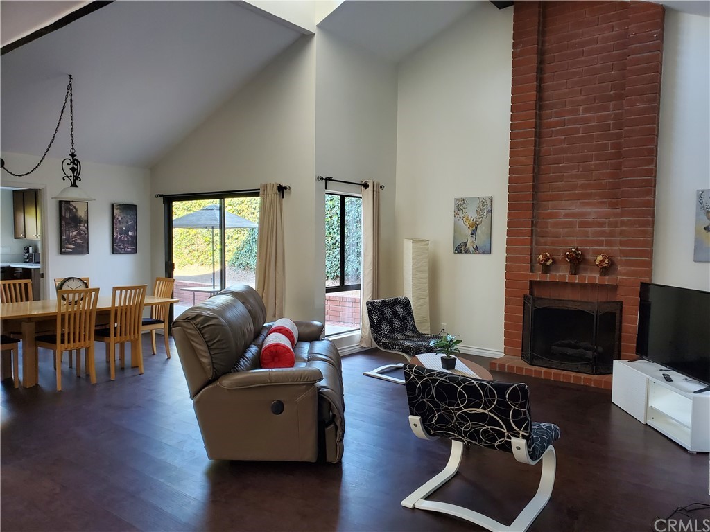 5001 Paseo Dali Irvine, CA 92603 - Photo 7 of 20 a living room with furniture window and a flat screen tv