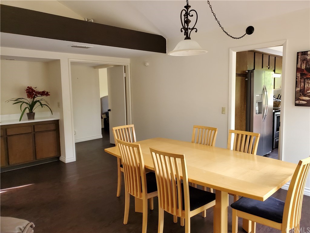 5001 Paseo Dali Irvine, CA 92603 - Photo 9 of 20 a dining room with furniture and window