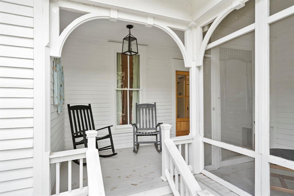 1502 West Virginia Street McKinney, TX 75069 - Photo 22 of 40 a view of staircase with railing and white walls
