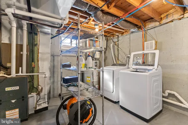 a utility room with dryer and washer