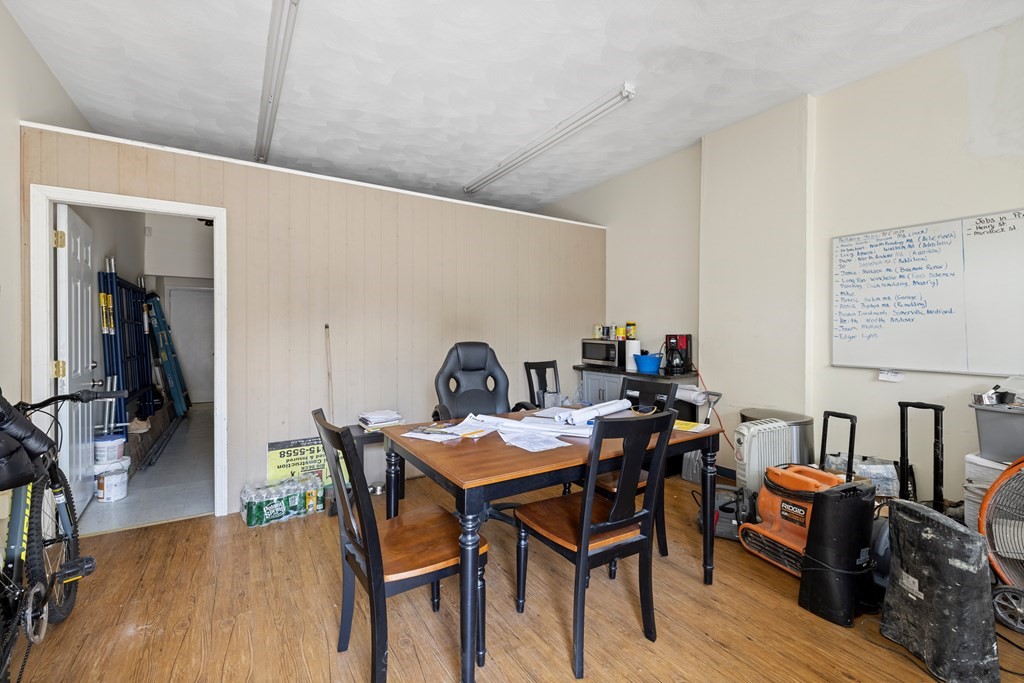 382 McGrath Highway Somerville, MA 02143 - Photo 26 of 31 a view of a dining room with furniture and wooden floor
