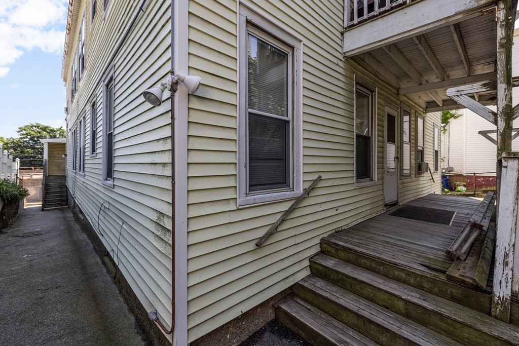 382 McGrath Highway Somerville, MA 02143 - Photo 29 of 31 a view of a balcony with two chairs and a table