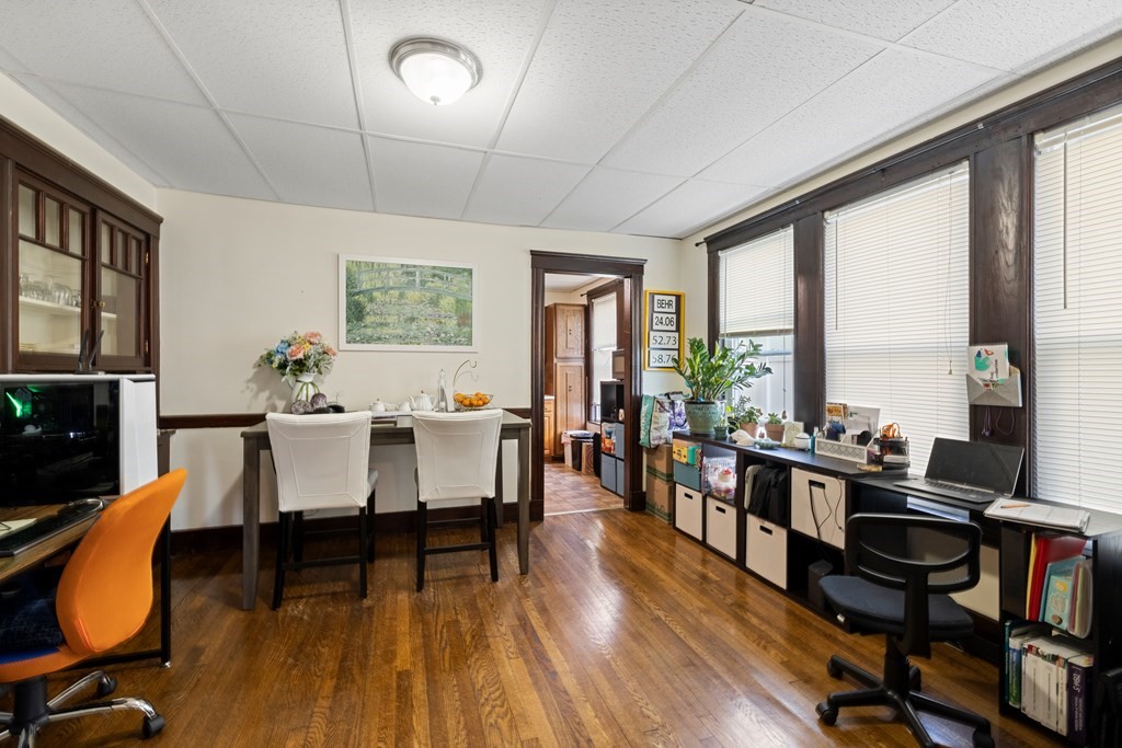 382 McGrath Highway Somerville, MA 02143 - Photo 9 of 31 a view of a dining room with furniture window and wooden floor